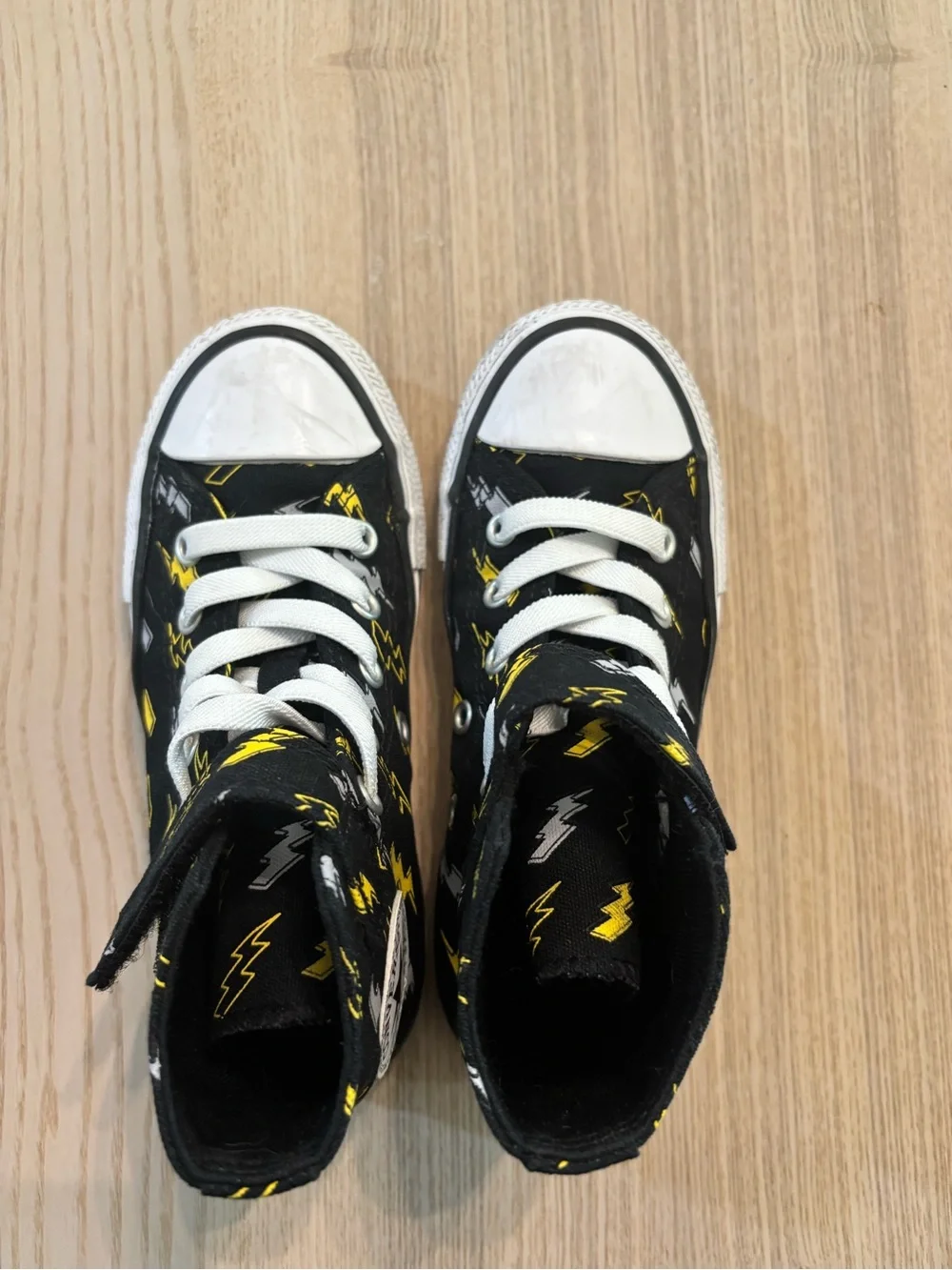 Converse Kids Black High Top Sneakers with Yellow Lightning Bolt Print